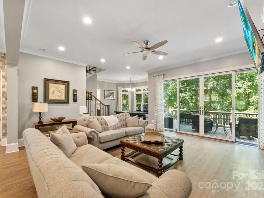 10007 Hillspring Drive, Huntersville, NC 28078.  MLS# CAR4272682, YatesRealty ID 25864. Expansive Quad French doors open to a spacious deck with sweeping views of the 1st tee