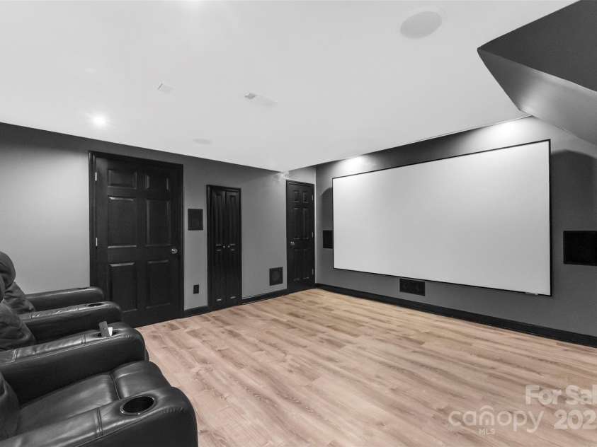 10007 Hillspring Drive, Huntersville, NC 28078.  MLS# CAR4272682, YatesRealty ID 25864. Lower level media room