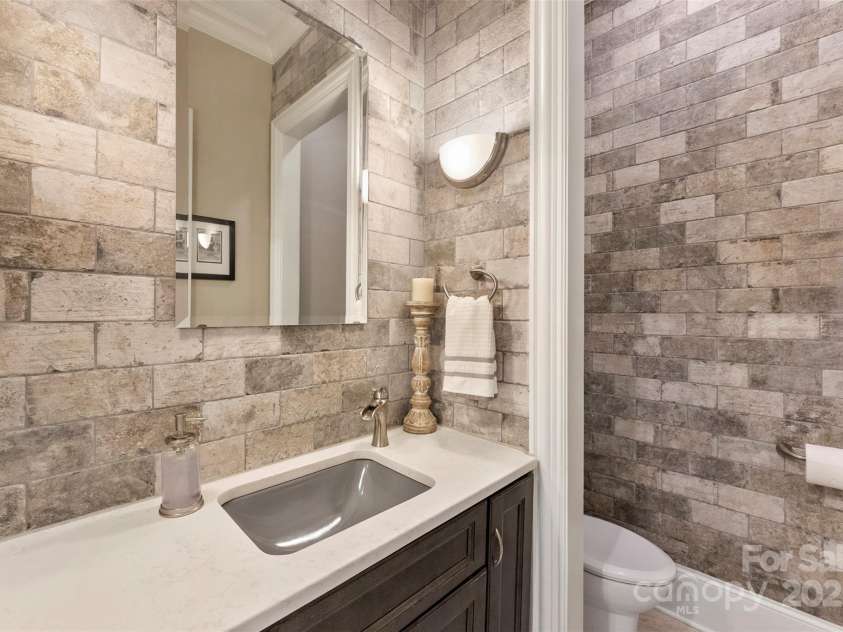 10007 Hillspring Drive, Huntersville, NC 28078.  MLS# CAR4272682, YatesRealty ID 25864. Powder room with old world charm