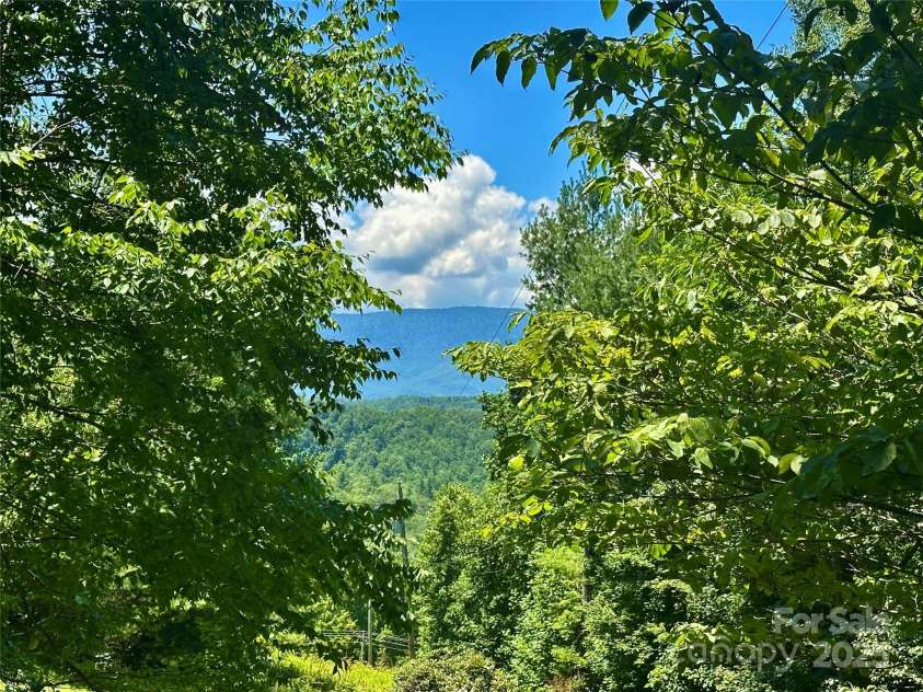 572 Blue Ridge Gem Stone Road, Spruce Pine, NC 28777.  MLS# CAR4279769, YatesRealty ID 25866. 