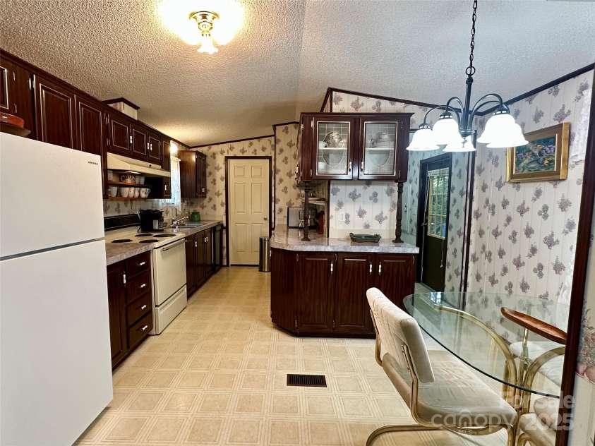 572 Blue Ridge Gem Stone Road, Spruce Pine, NC 28777.  MLS# CAR4279769, YatesRealty ID 25866. Master Bedroom 