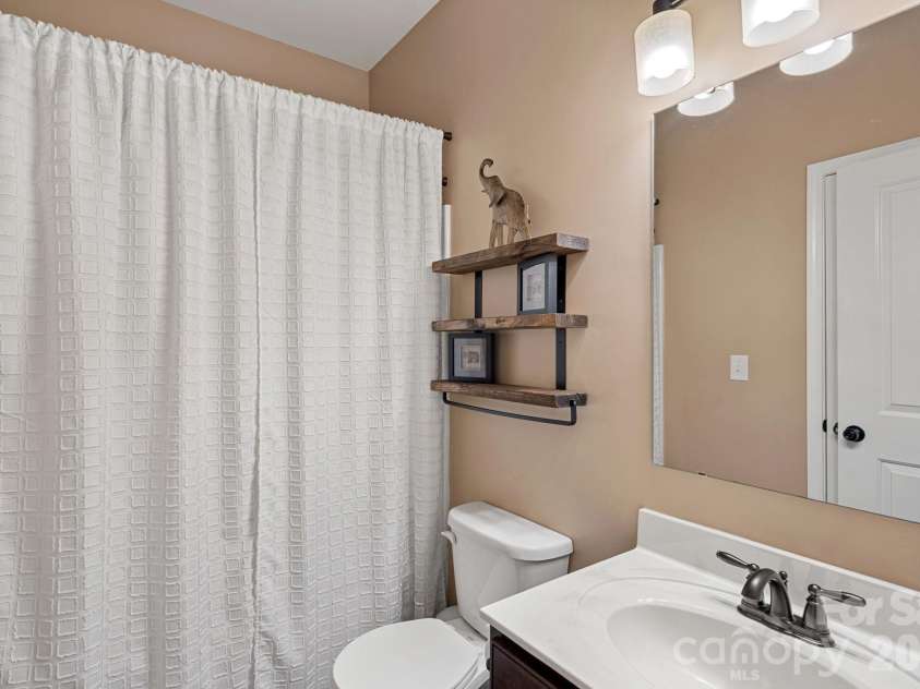 1203 Guadalupe Lane, Charlotte, NC 28214.  MLS# CAR4362862, YatesRealty ID 25873. 1st Floor Full Bathroom