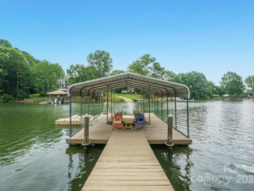232 Elysian Drive, Mooresville, NC 28117.  MLS# CAR4275042, YatesRealty ID 25874. Covered pier with lift