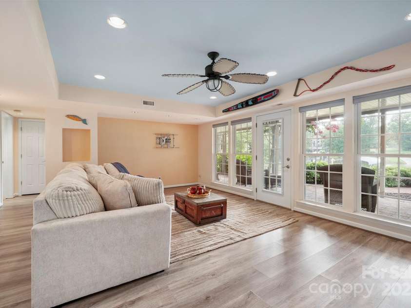 232 Elysian Drive, Mooresville, NC 28117.  MLS# CAR4275042, YatesRealty ID 25874. Family room with water views