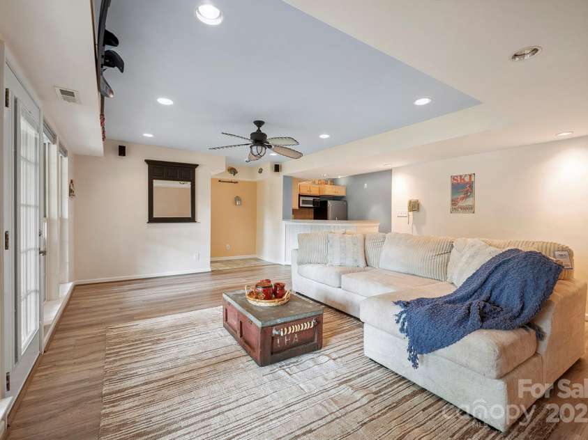 232 Elysian Drive, Mooresville, NC 28117.  MLS# CAR4275042, YatesRealty ID 25874. Family room with water views