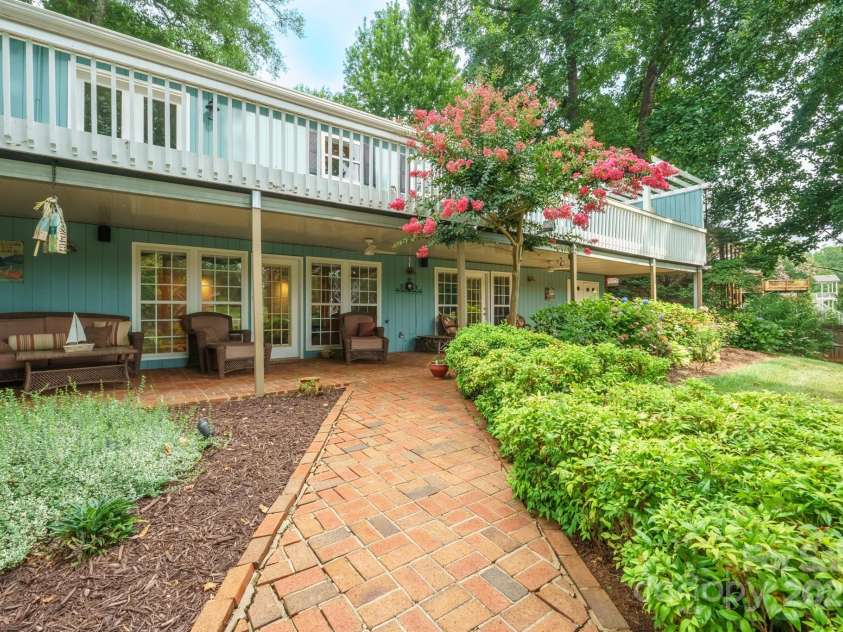 232 Elysian Drive, Mooresville, NC 28117.  MLS# CAR4275042, YatesRealty ID 25874. Gently sloping lot