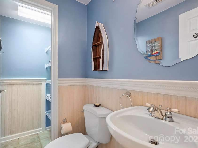 232 Elysian Drive, Mooresville, NC 28117.  MLS# CAR4275042, YatesRealty ID 25874. Half bath on lower level for water front guests