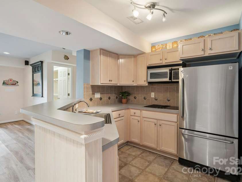 232 Elysian Drive, Mooresville, NC 28117.  MLS# CAR4275042, YatesRealty ID 25874. Lower level kitchen