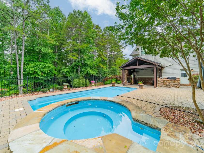 9202 Arlington Hills Drive, Mint Hill, NC 28227.  MLS# CAR4262986, YatesRealty ID 25878. Backyard Hottub