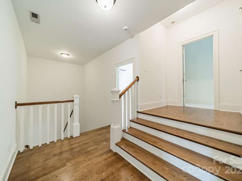 9202 Arlington Hills Drive, Mint Hill, NC 28227.  MLS# CAR4262986, YatesRealty ID 25878. Stairs to 3rd floor bonus room *unfinished*