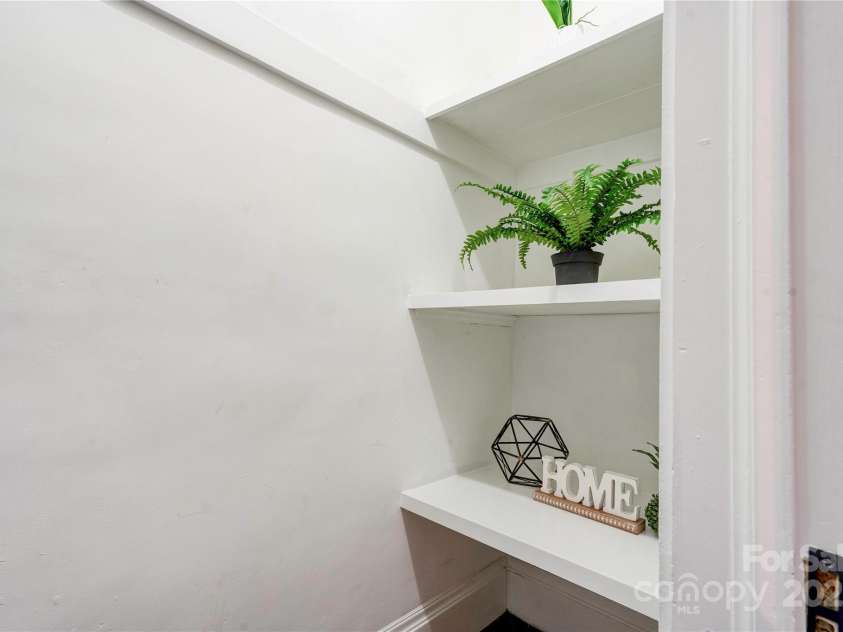 1217 York Street, Gastonia, NC 28052.  MLS# CAR4273651, YatesRealty ID 25883. Laundry room shelving