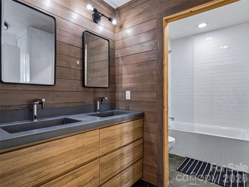 100 Big Spring Drive, Asheville, NC 28804.  MLS# CAR4375270, YatesRealty ID 25890. Full bathroom on upper floor.