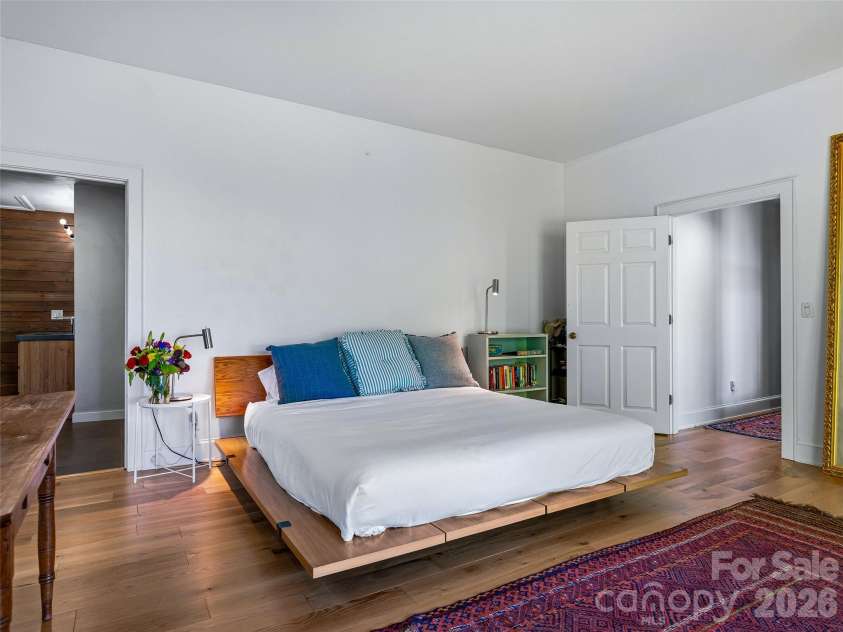 100 Big Spring Drive, Asheville, NC 28804.  MLS# CAR4375270, YatesRealty ID 25890. Primary suite 2 on the lower level.