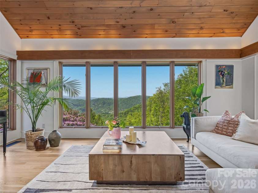 100 Big Spring Drive, Asheville, NC 28804.  MLS# CAR4375270, YatesRealty ID 25890. Stately clerestory windows frame picture-perfect views.