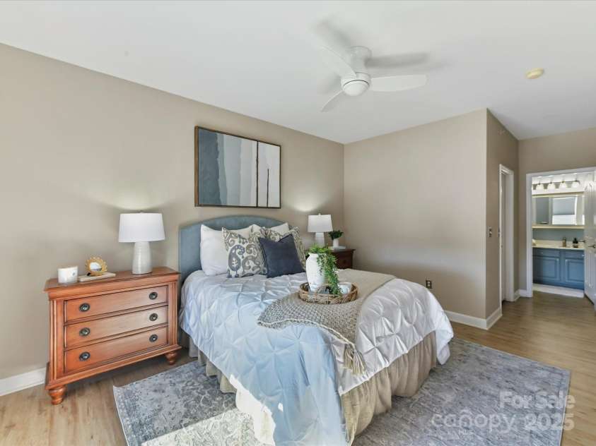 19763 Deer Valley Drive, Cornelius, NC 28031.  MLS# CAR4333063, YatesRealty ID 25893. Spacious Primary suite with ceiling fan/light, private bath & walk in closet!