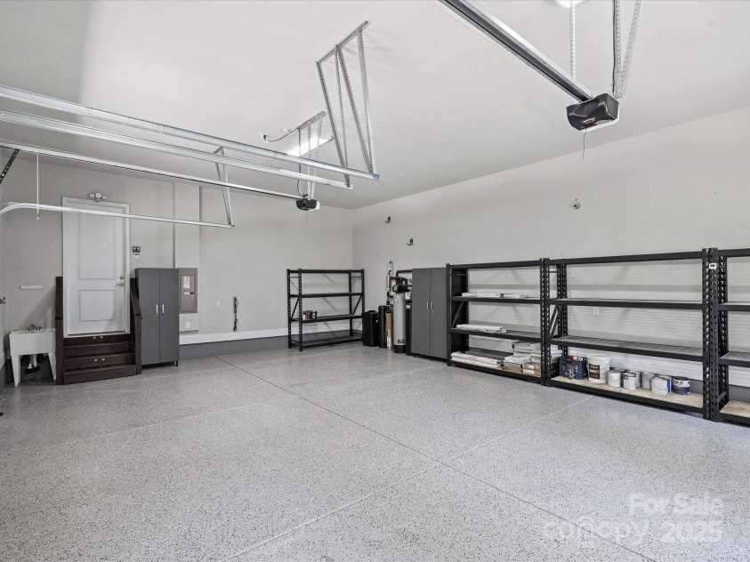 631 May Green Drive, Clover, SC 29710.  MLS# CAR4274368, YatesRealty ID 25894. 2 Car Garage with Utility Sink- Storage Shelving and Cabinets Convey