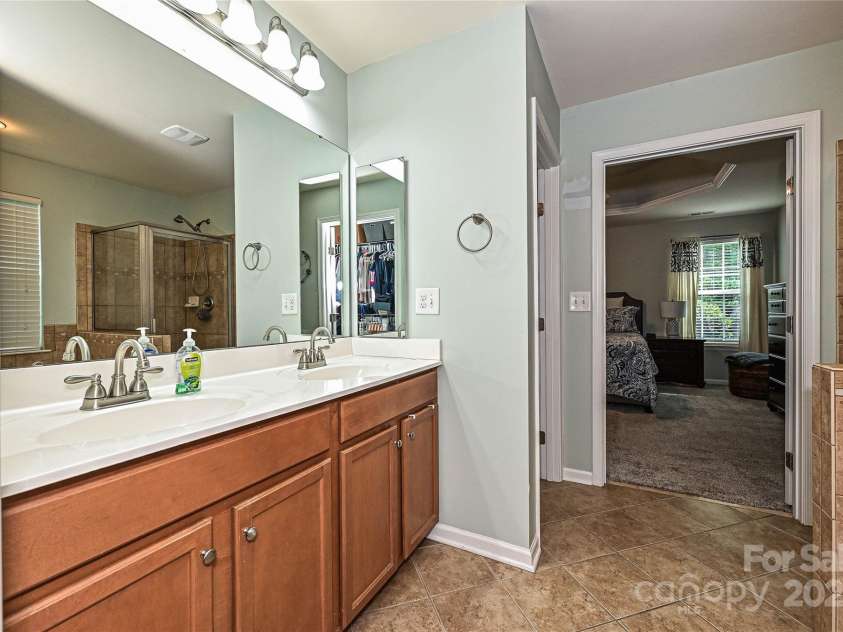4018 Harmattan Drive, Denver, NC 28037.  MLS# CAR4259342, YatesRealty ID 25896. Primary Bathroom
