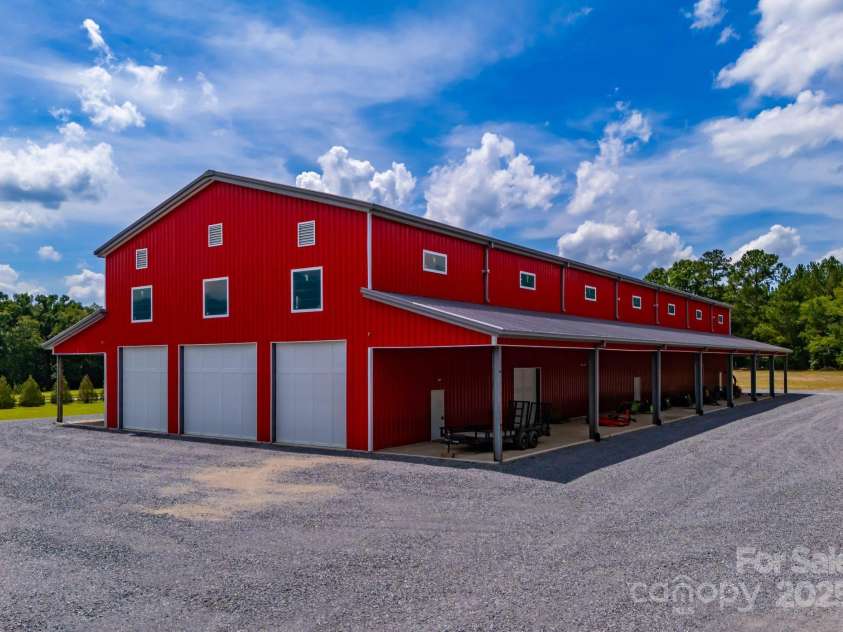 3759 NC 24/27 Highway, Cameron, NC 28326.  MLS# CAR4277323, YatesRealty ID 25897. 200x60 Red Barn With Multiple Garages & Entry Points