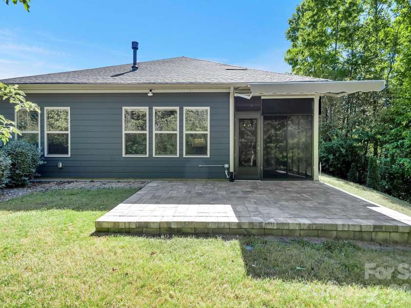 4097 Canopy Creek Drive, Denver, NC 28037.  MLS# CAR4373719, YatesRealty ID 25897. Paver Patio with Sunsetter Retractable Awning