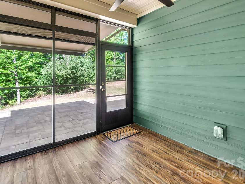 4097 Canopy Creek Drive, Denver, NC 28037.  MLS# CAR4373719, YatesRealty ID 25897. Screen Porch with EZ View Windows, Sunsetter Shades