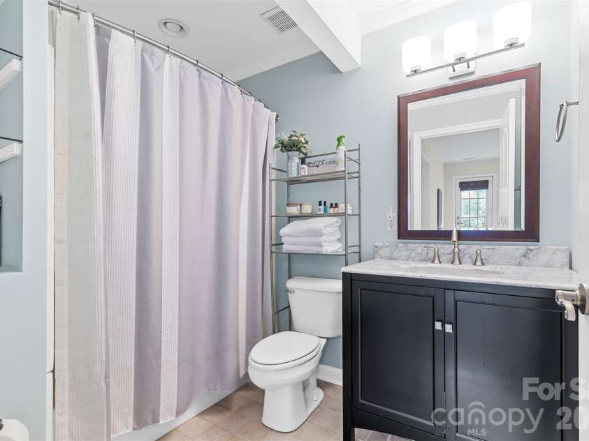 7710 Ninth Fairway Lane, Mint Hill, NC 28227.  MLS# CAR4382520, YatesRealty ID 25898. Basement full bathroom