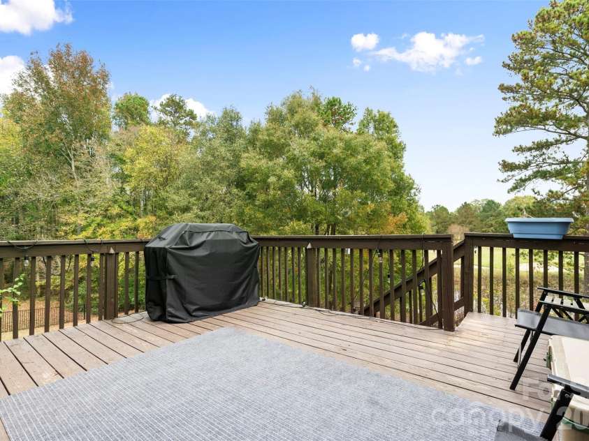 7710 Ninth Fairway Lane, Mint Hill, NC 28227.  MLS# CAR4382520, YatesRealty ID 25898. Main level desk overlooking the green