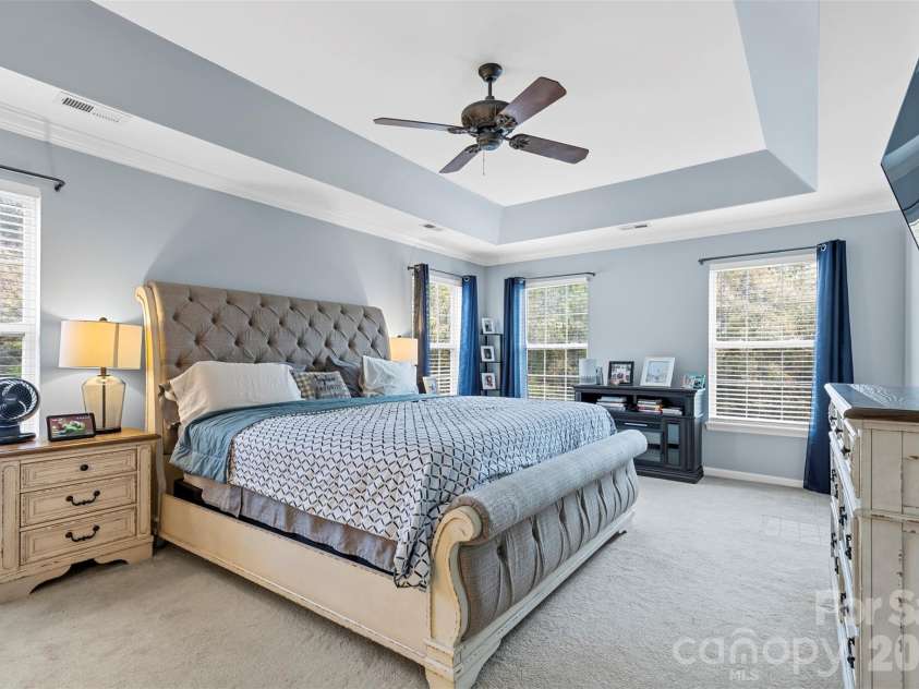 7710 Ninth Fairway Lane, Mint Hill, NC 28227.  MLS# CAR4382520, YatesRealty ID 25898. Primary bedroom