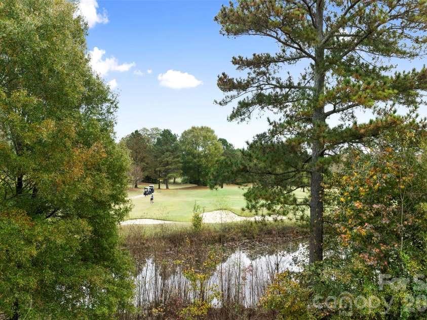 7710 Ninth Fairway Lane, Mint Hill, NC 28227.  MLS# CAR4382520, YatesRealty ID 25898. View from your back deck