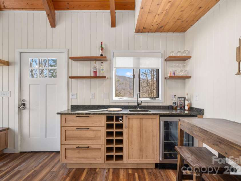 158 Blackberry Lane, Maggie Valley, NC 28751.  MLS# CAR4242897, YatesRealty ID 259. Front Door and Bar Area