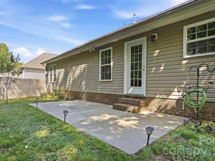 1124 Turtle Ridge Drive, Monroe, NC 28110.  MLS# CAR4372125, YatesRealty ID 25900. Extended Backyard Patio