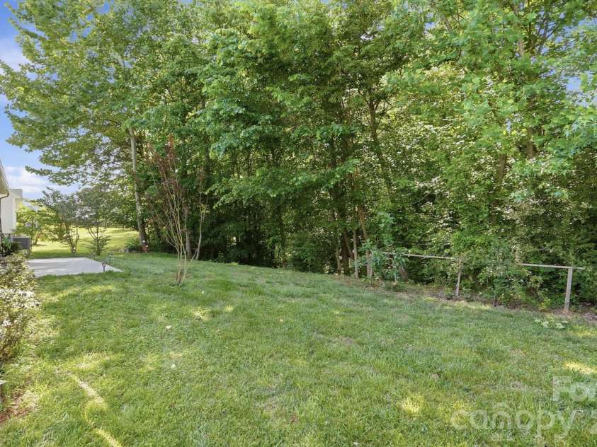 1124 Turtle Ridge Drive, Monroe, NC 28110.  MLS# CAR4372125, YatesRealty ID 25900. Lot goes Deep in the trees