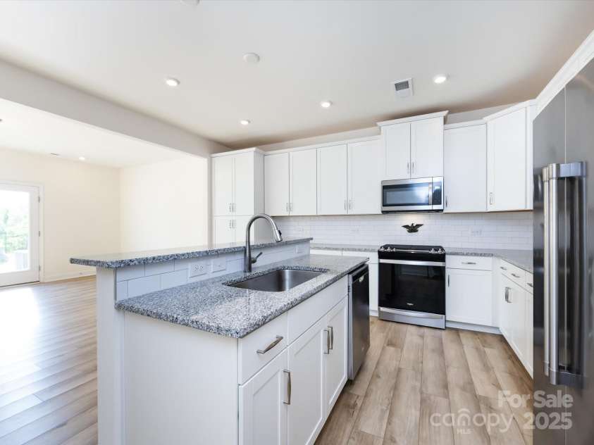 1206 Pebble Grove Drive, Clover, SC 29710.  MLS# CAR4275346, YatesRealty ID 25906. Beautiful kitchen island