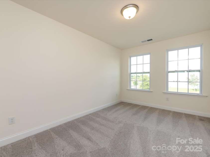 1206 Pebble Grove Drive, Clover, SC 29710.  MLS# CAR4275346, YatesRealty ID 25906. Second bedroom.