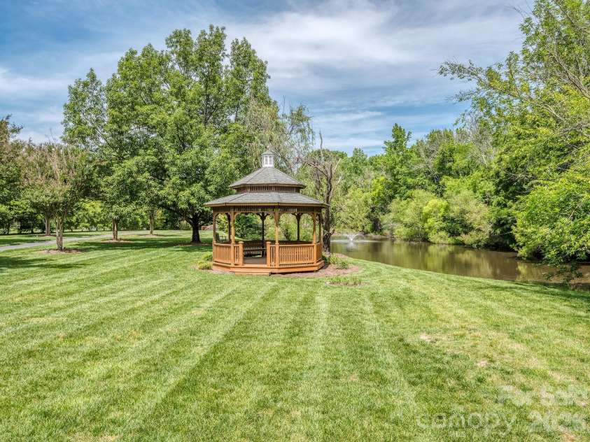 9205 Belmont Lane, Waxhaw, NC 28173.  MLS# CAR4381231, YatesRealty ID 25906. Community pond