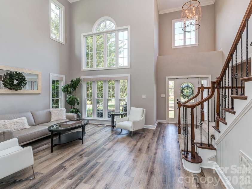 9205 Belmont Lane, Waxhaw, NC 28173.  MLS# CAR4381231, YatesRealty ID 25906. Front staircase, foyer, living room