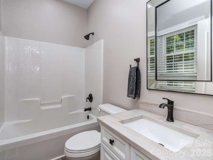 9205 Belmont Lane, Waxhaw, NC 28173.  MLS# CAR4381231, YatesRealty ID 25906. Full en suite bath in guest room