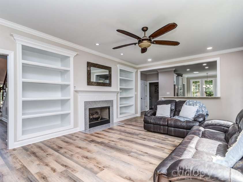 9205 Belmont Lane, Waxhaw, NC 28173.  MLS# CAR4381231, YatesRealty ID 25906. Great room with gas fire place and built ins