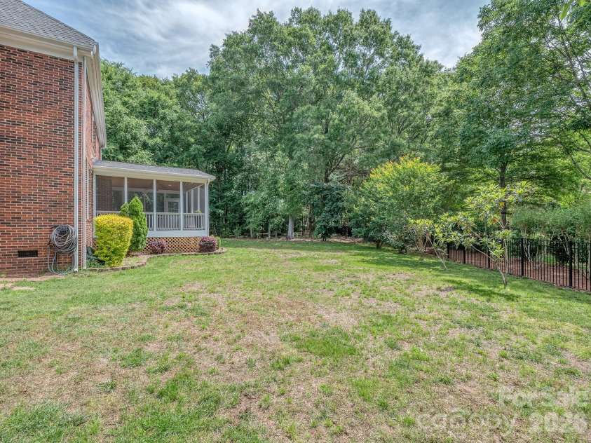 9205 Belmont Lane, Waxhaw, NC 28173.  MLS# CAR4381231, YatesRealty ID 25906. Rear yard