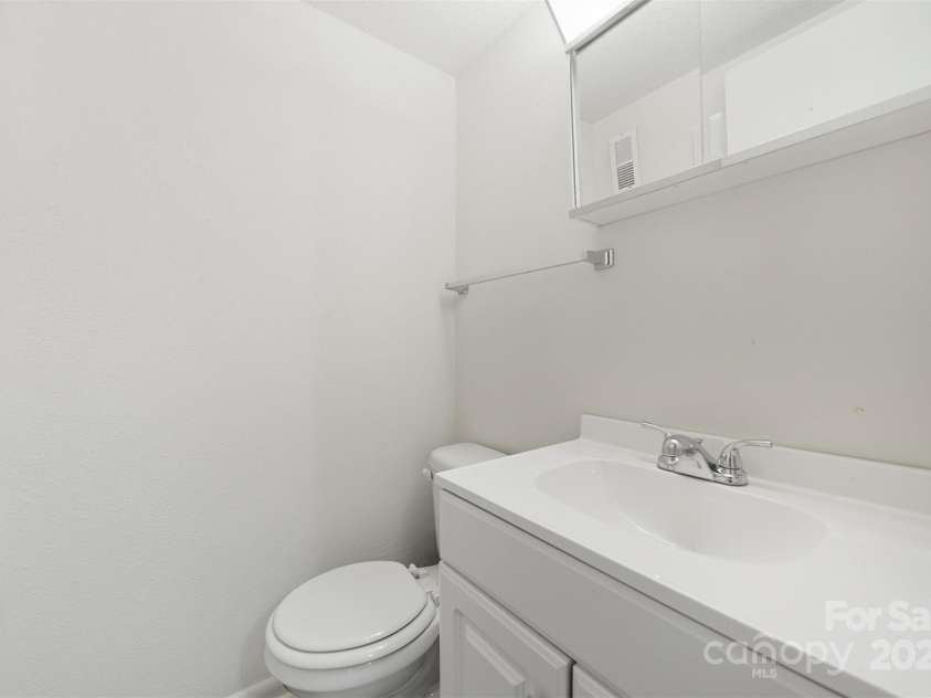 824 6th Street, Hickory, NC 28601.  MLS# CAR4326428, YatesRealty ID 25907. Main level powder room