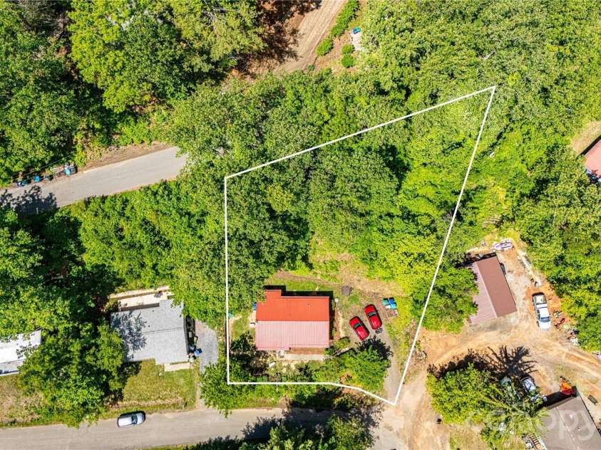 203 Kennedy Drive, Swannanoa, NC 28778.  MLS# CAR4381236, YatesRealty ID 25908. Lines are approximate. Extra lot.