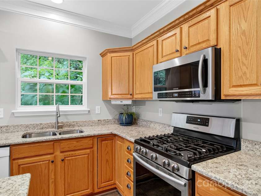 112 Sugar Thyme Lane, Mooresville, NC 28115.  MLS# CAR4294431, YatesRealty ID 2591. Fresh Paint, New Crown Moulding, New Granite Countertops and Gas Range