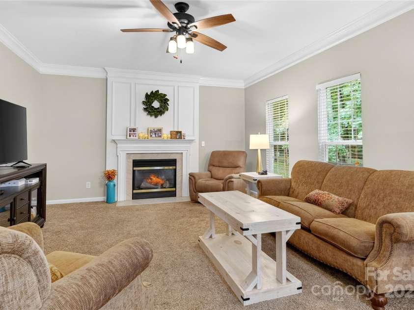 112 Sugar Thyme Lane, Mooresville, NC 28115.  MLS# CAR4294431, YatesRealty ID 2591. Inviting gas fireplace
