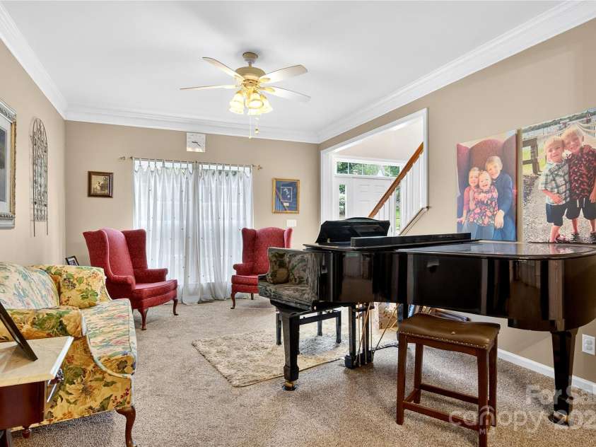 112 Sugar Thyme Lane, Mooresville, NC 28115.  MLS# CAR4294431, YatesRealty ID 2591. Living room large enough for a piano