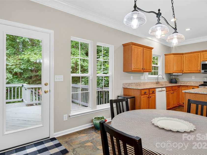 112 Sugar Thyme Lane, Mooresville, NC 28115.  MLS# CAR4294431, YatesRealty ID 2591. New back door leading to large deck