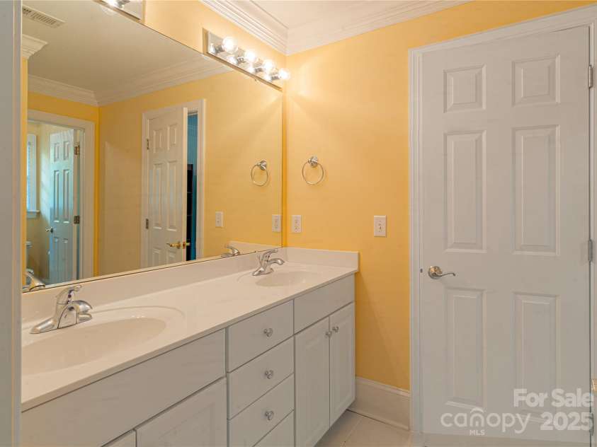 10405 Lady Grace Lane, Charlotte, NC 28270.  MLS# CAR4273475, YatesRealty ID 25913. JACK & JILL BATHROOM