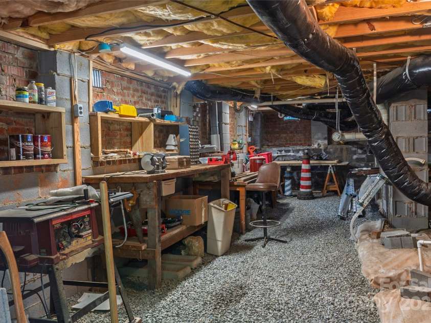 10405 Lady Grace Lane, Charlotte, NC 28270.  MLS# CAR4273475, YatesRealty ID 25913. WORKSHOP in CRAWL SPACE