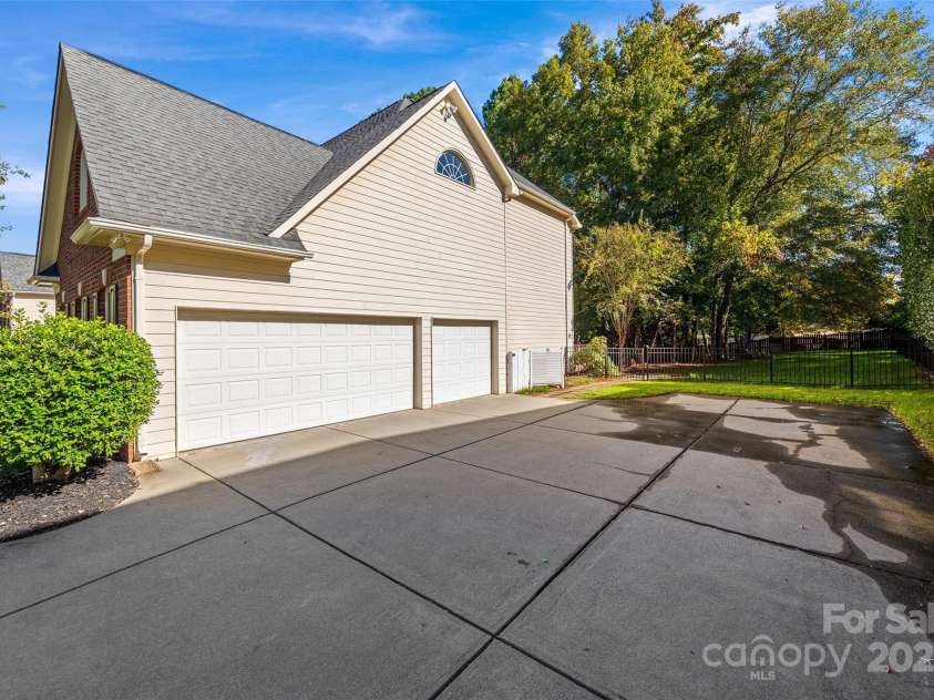 7146 Harcourt Crossing, Indian Land, SC 29707.  MLS# CAR4313502, YatesRealty ID 25914. 3 car garage w/ extra driveway parking
