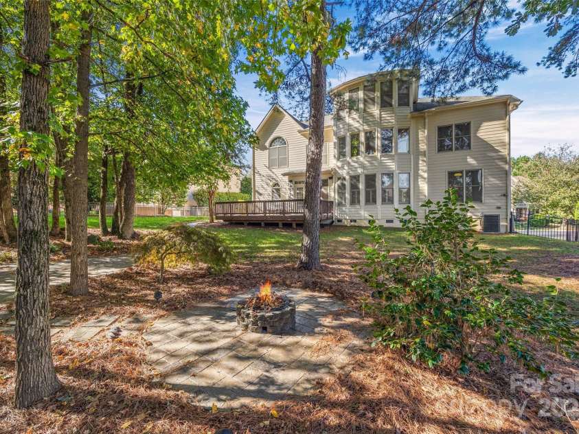 7146 Harcourt Crossing, Indian Land, SC 29707.  MLS# CAR4313502, YatesRealty ID 25914. Back Yard Oasis w/ fire pit