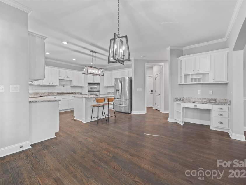 7146 Harcourt Crossing, Indian Land, SC 29707.  MLS# CAR4313502, YatesRealty ID 25914. Breakfast Area & Kitchen w/ built-in desk