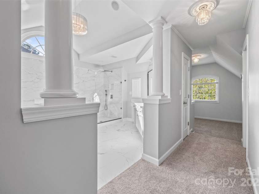 7146 Harcourt Crossing, Indian Land, SC 29707.  MLS# CAR4313502, YatesRealty ID 25914. Primary Suite Bath/ Hallway to closets and front flex room